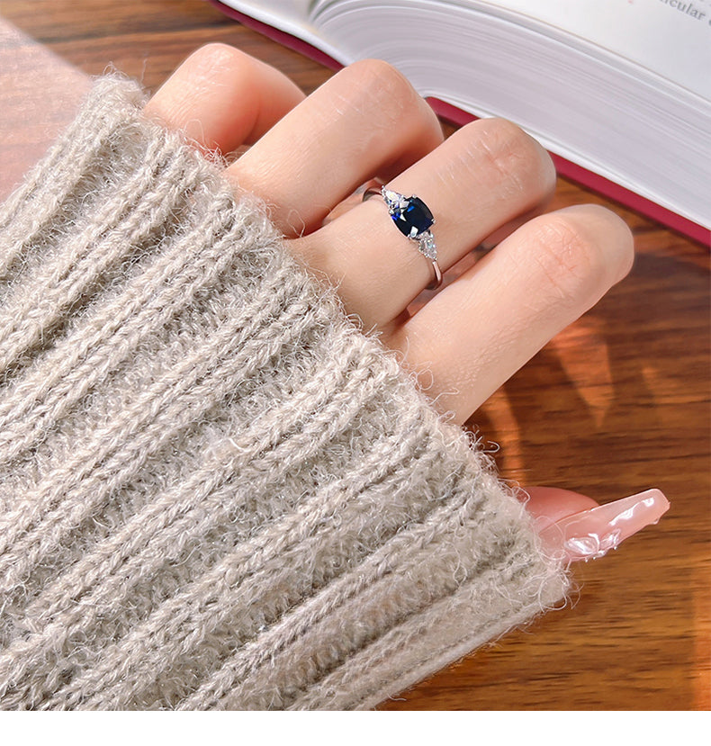 Three Stone Blue Cushion Cut Sterling Silver Ring