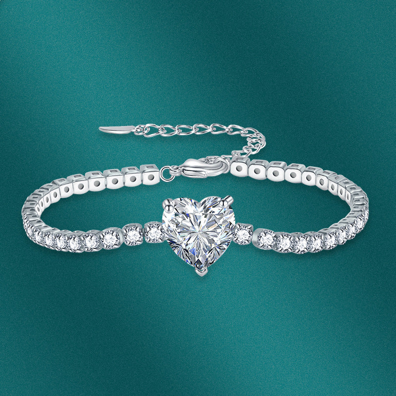 Sweet Heart Cut Tennis Bracelet In Silver Tone