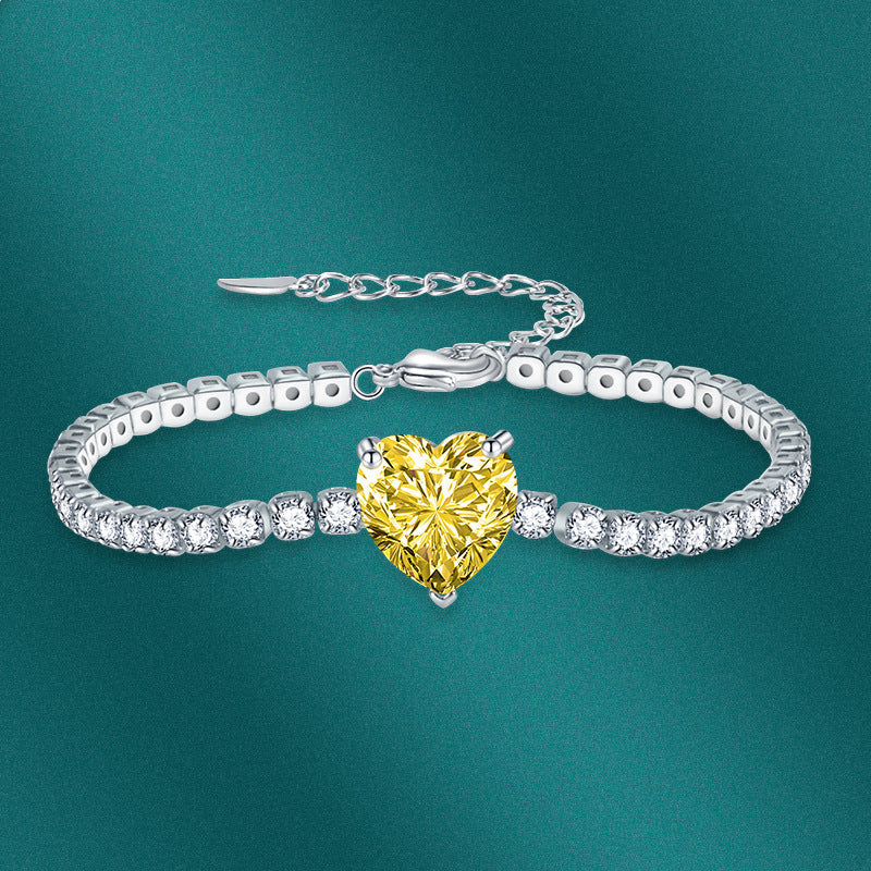 Sweet Heart Cut Tennis Bracelet In Silver Tone