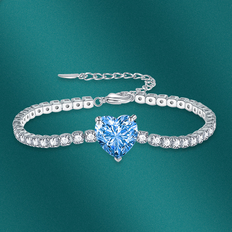 Sweet Heart Cut Tennis Bracelet In Silver Tone