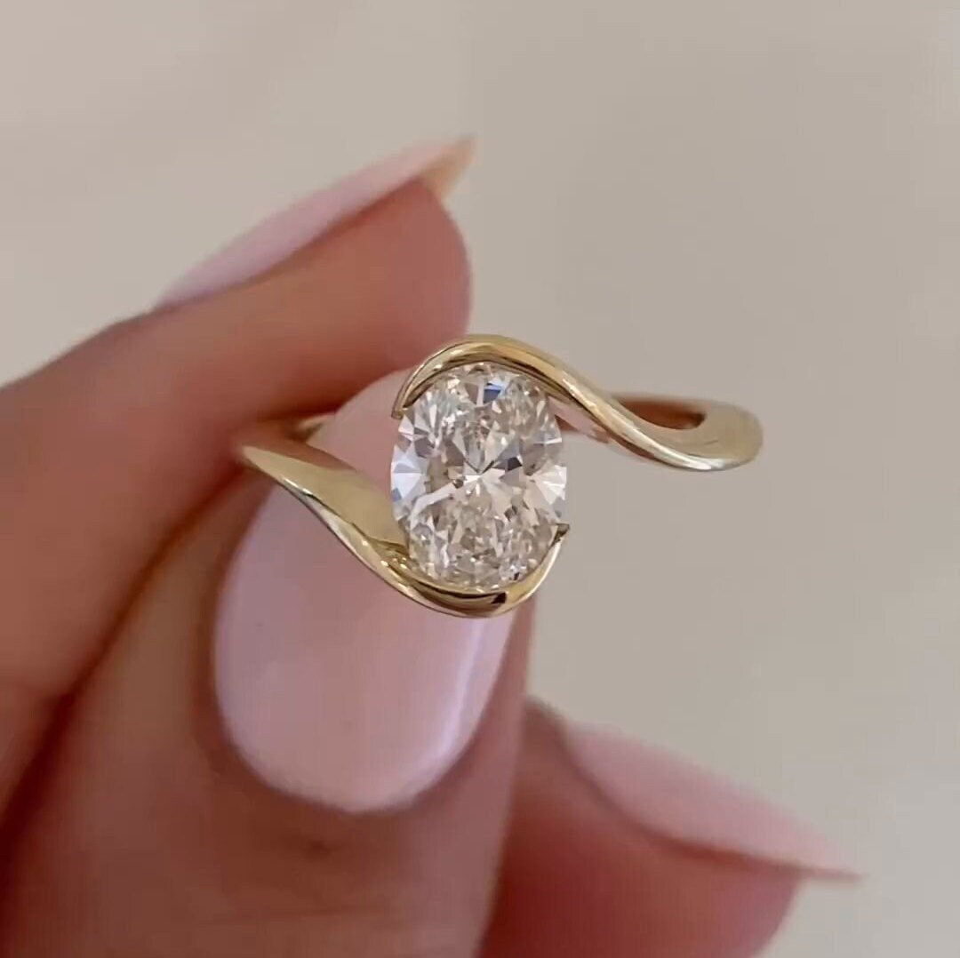 Oval Cut Bypass Solitaire Engagement Ring in Sterling Silver