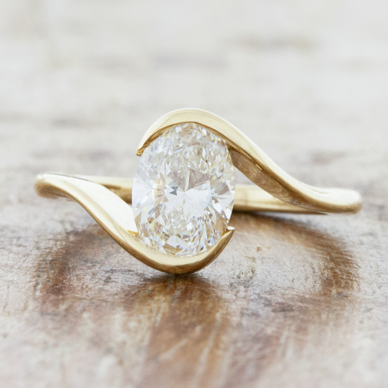 Oval Cut Bypass Solitaire Engagement Ring in Sterling Silver