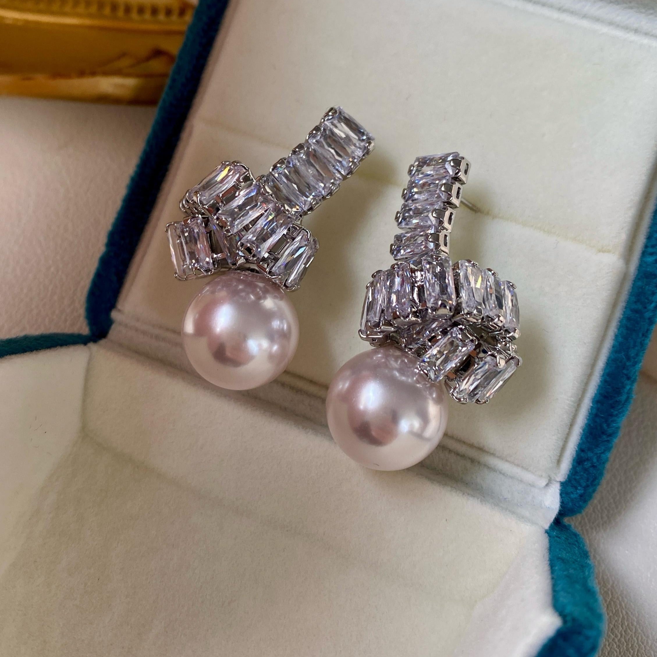 Elegant Pearl Drop Earrings with Baguette Stone Accents