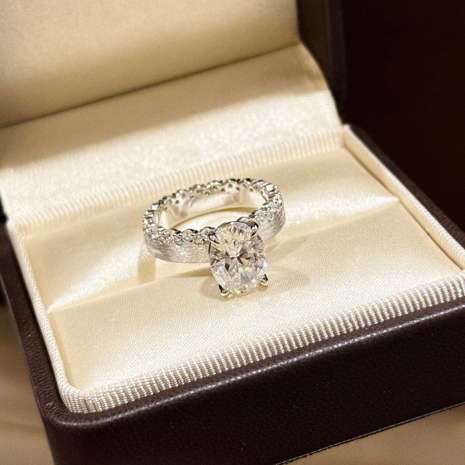 Elegant Textured Band & Side Stones Solitaire Oval Cut Sterling Silver Ring