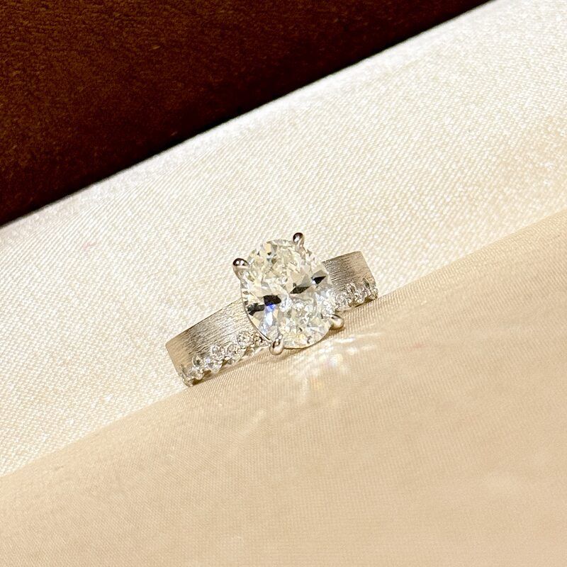 Elegant Textured Band & Side Stones Solitaire Oval Cut Sterling Silver Ring