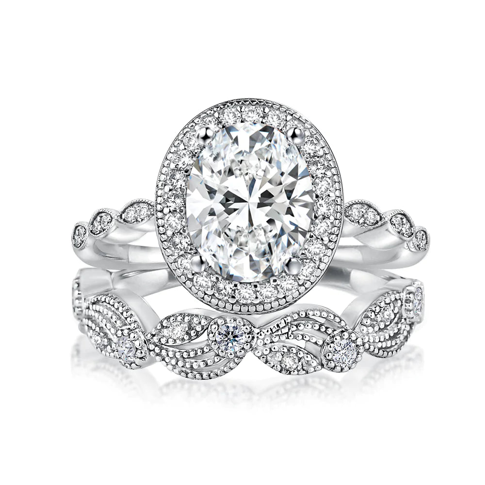 Unique Design Leaf & Vine Halo Oval Cut Bridal Set in Sterling Silver