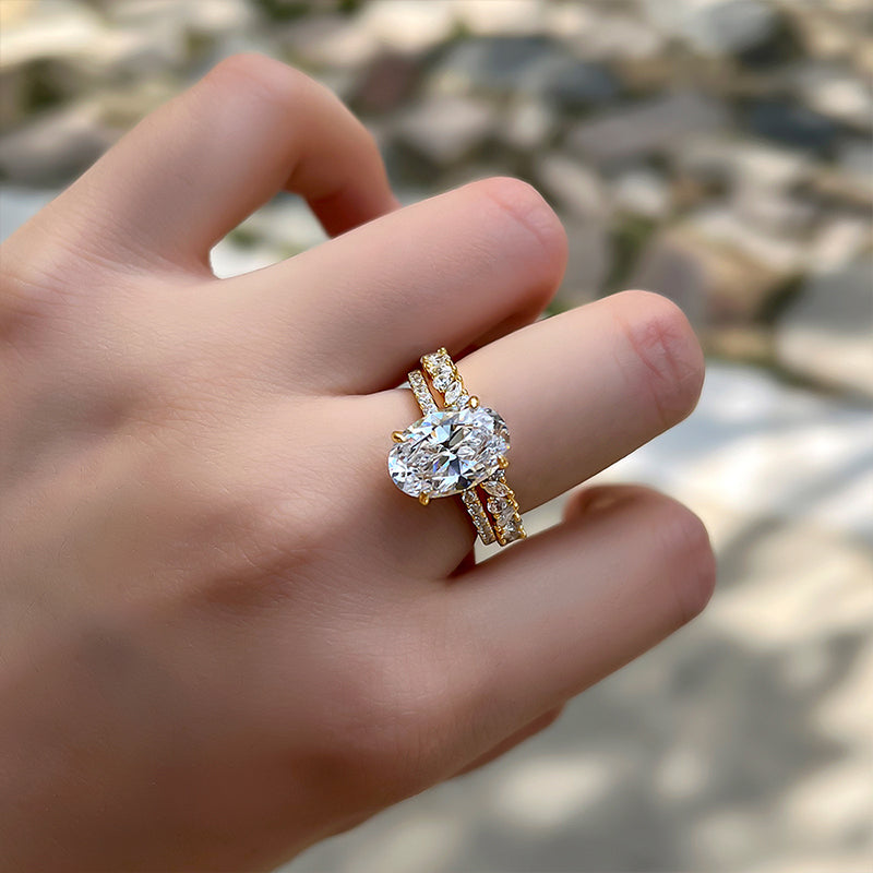 Golden Tone Oval Cut Sterling Silver Bridal Set with Exquisite Marquise & Round Cut Band
