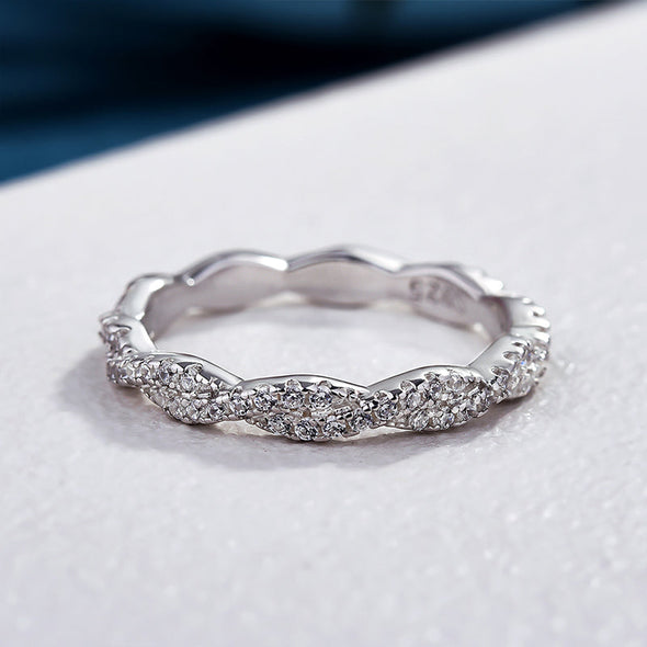 Elegant Pave Twist Eternity Wedding Band In Sterling Silver