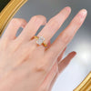 Gleaming Sterling Silver Engagement Ring in Radiant Cut and Golden Tone