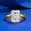 Gleaming Sterling Silver Engagement Ring in Radiant Cut and Golden Tone