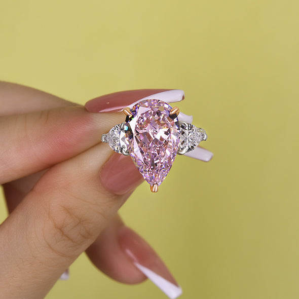 Stunning Pear Cut Pink Three Stone Engagement Ring