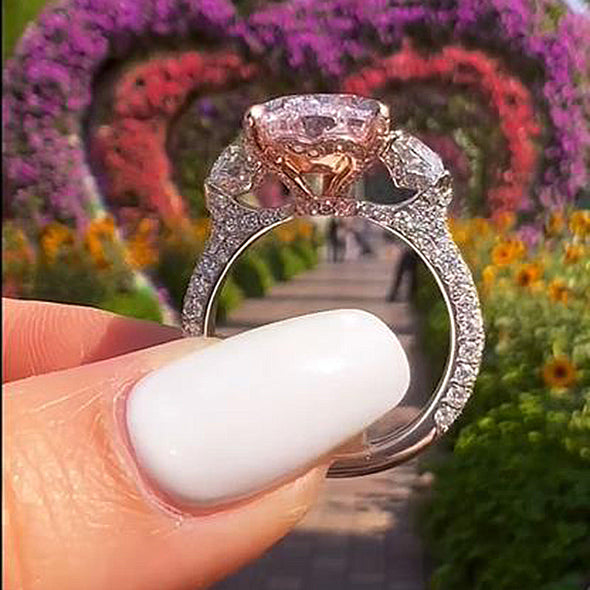 Stunning Pear Cut Pink Three Stone Engagement Ring