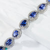 Oval Cut Sapphire Tennis Bracelet in Sterling Silver