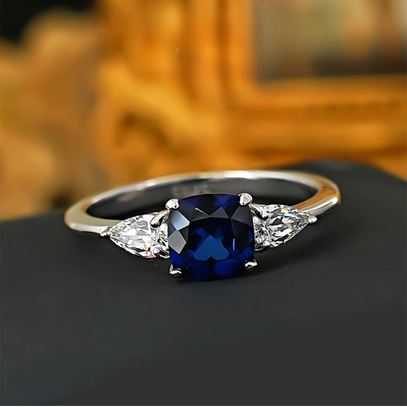 Three Stone Blue Cushion Cut Sterling Silver Ring