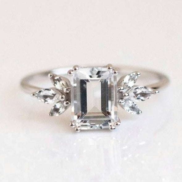 Emerald Cut with Marquise Side Stone Engagement Ring