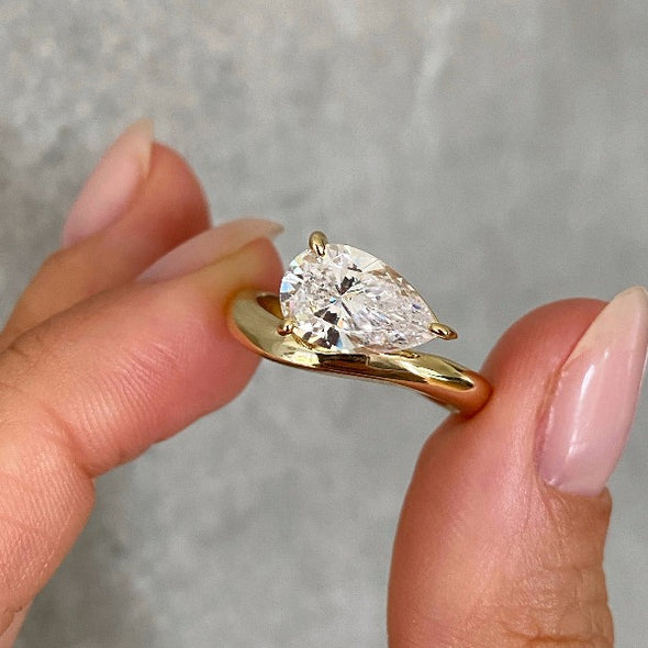 Pear Cut East to West Engagement Ring