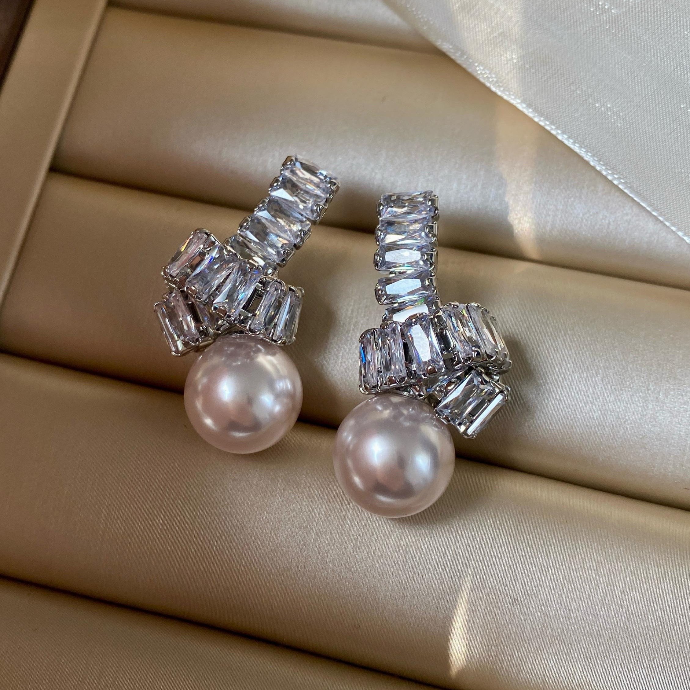 Elegant Pearl Drop Earrings with Baguette Stone Accents