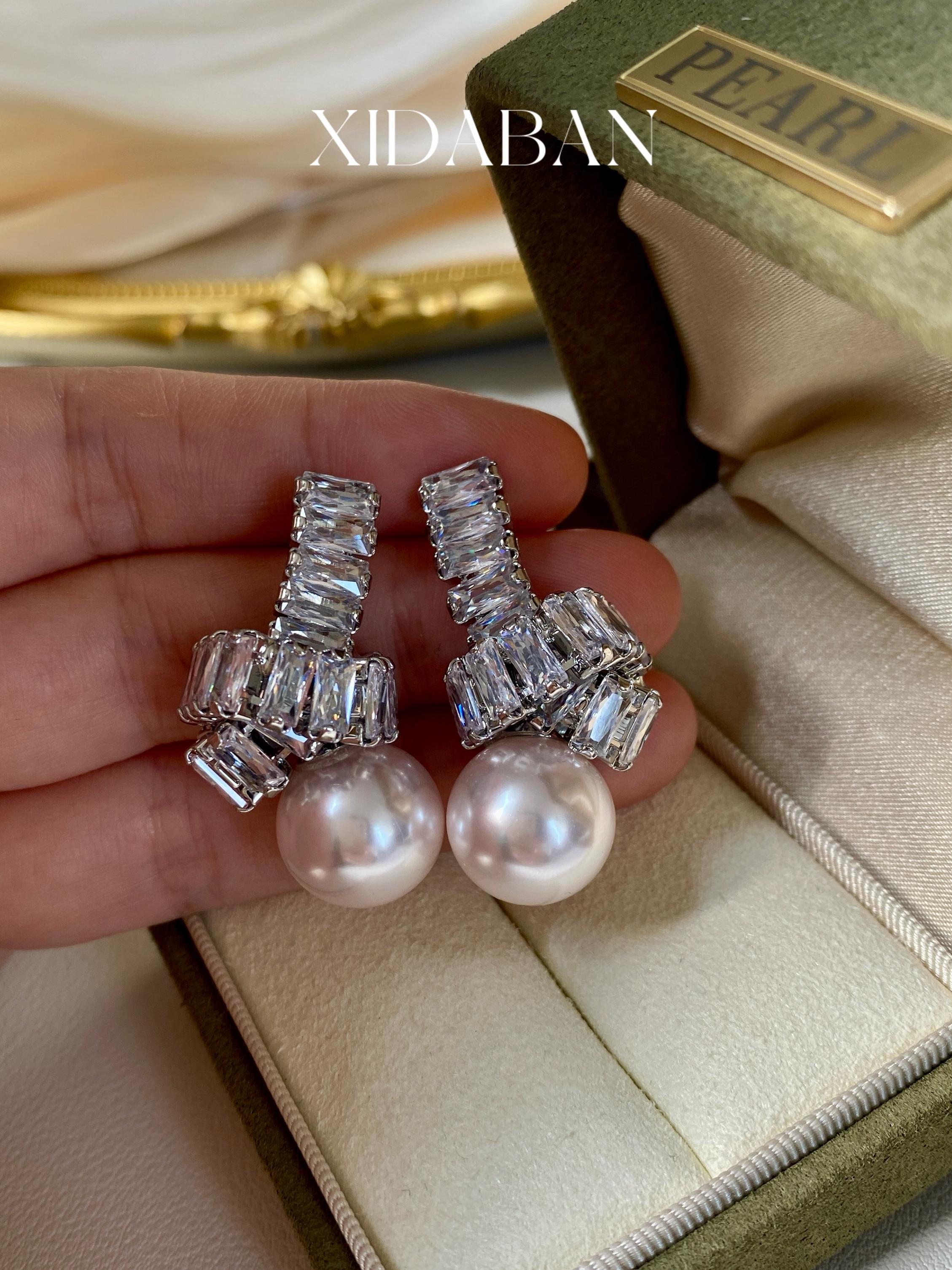 Elegant Pearl Drop Earrings with Baguette Stone Accents