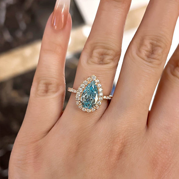 2pcs Halo Pear Cut Cyan Blue Bridal Set Rings in Sterling Silver In Rose Golden Tone