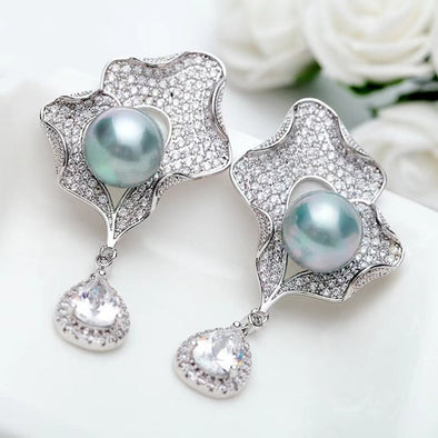 Elegant Pearl Shell Design Drop Earrings in Sterling Silver