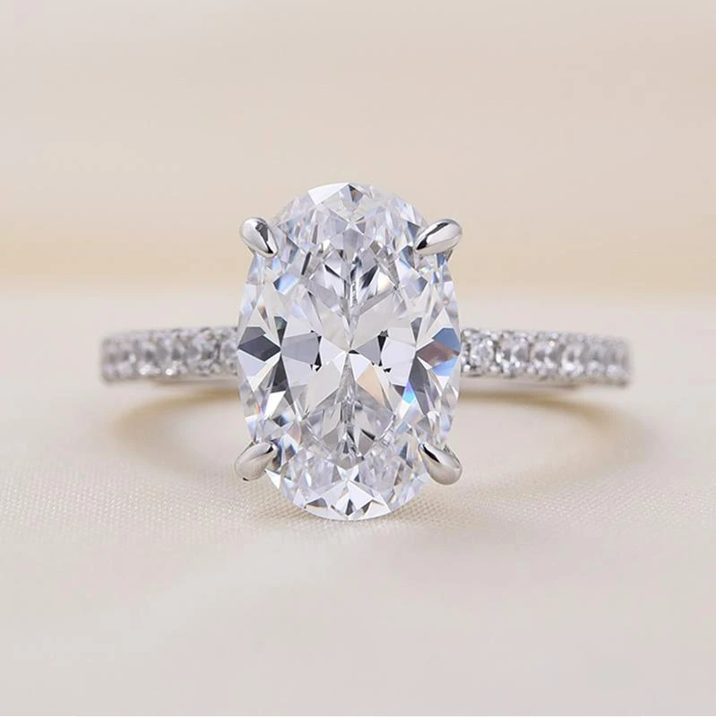 Classic Oval Cut Sterling Silver Bridal Set with Half-Eternity Band