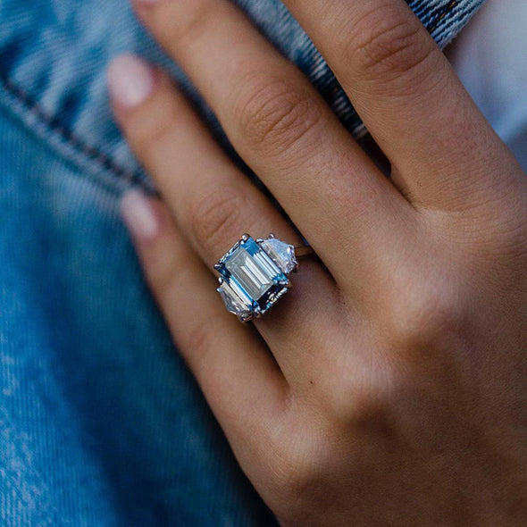 Light Aquamarine Emerald Cut Three Stone Engagement Ring In Sterling Silver