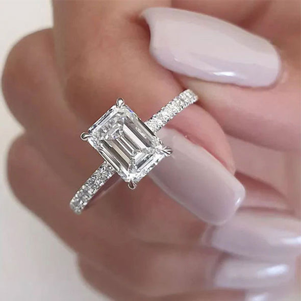 Classic Emerald Cut Engagement Ring In Sterling Silver