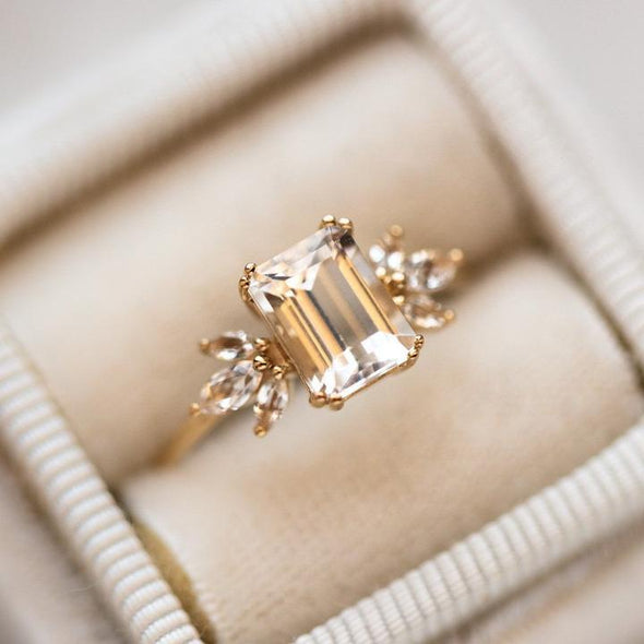 Emerald Cut with Marquise Side Stone Engagement Ring