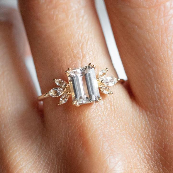 Emerald Cut with Marquise Side Stone Engagement Ring