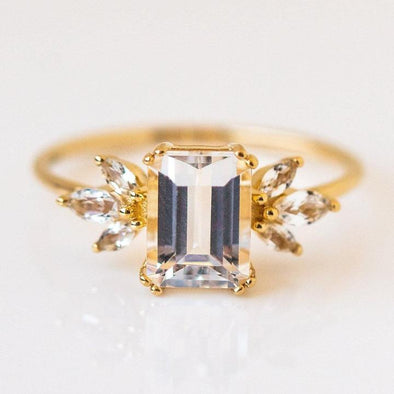 Emerald Cut with Marquise Side Stone Engagement Ring