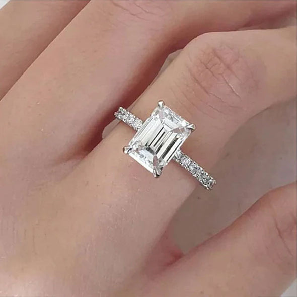 Classic Emerald Cut Engagement Ring In Sterling Silver