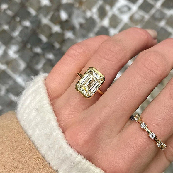 Elegant Emerald Cut Sterling Silver Bezel Engagement Ring In Golden Tone