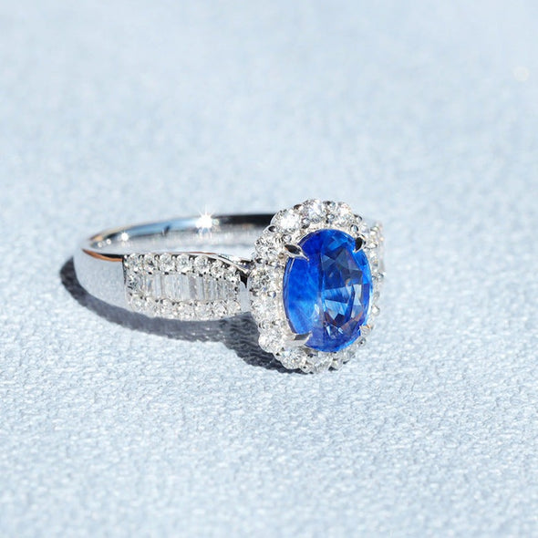 Halo Oval Cut Blue Sapphire Engagement Ring in Sterling Silver