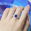 Halo Oval Cut Blue Sapphire Engagement Ring in Sterling Silver