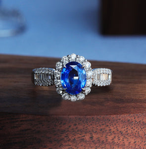 Halo Oval Cut Blue Sapphire Engagement Ring in Sterling Silver