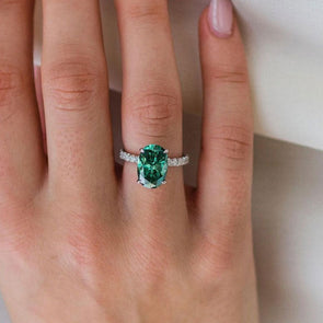 Classic Oval Cut Solitaire Emerald Green Engagement Ring In Sterling Silver