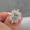 Blue Radiant Cut Engagement Ring in Sterling Silver with Marquise Cluster Side Stone